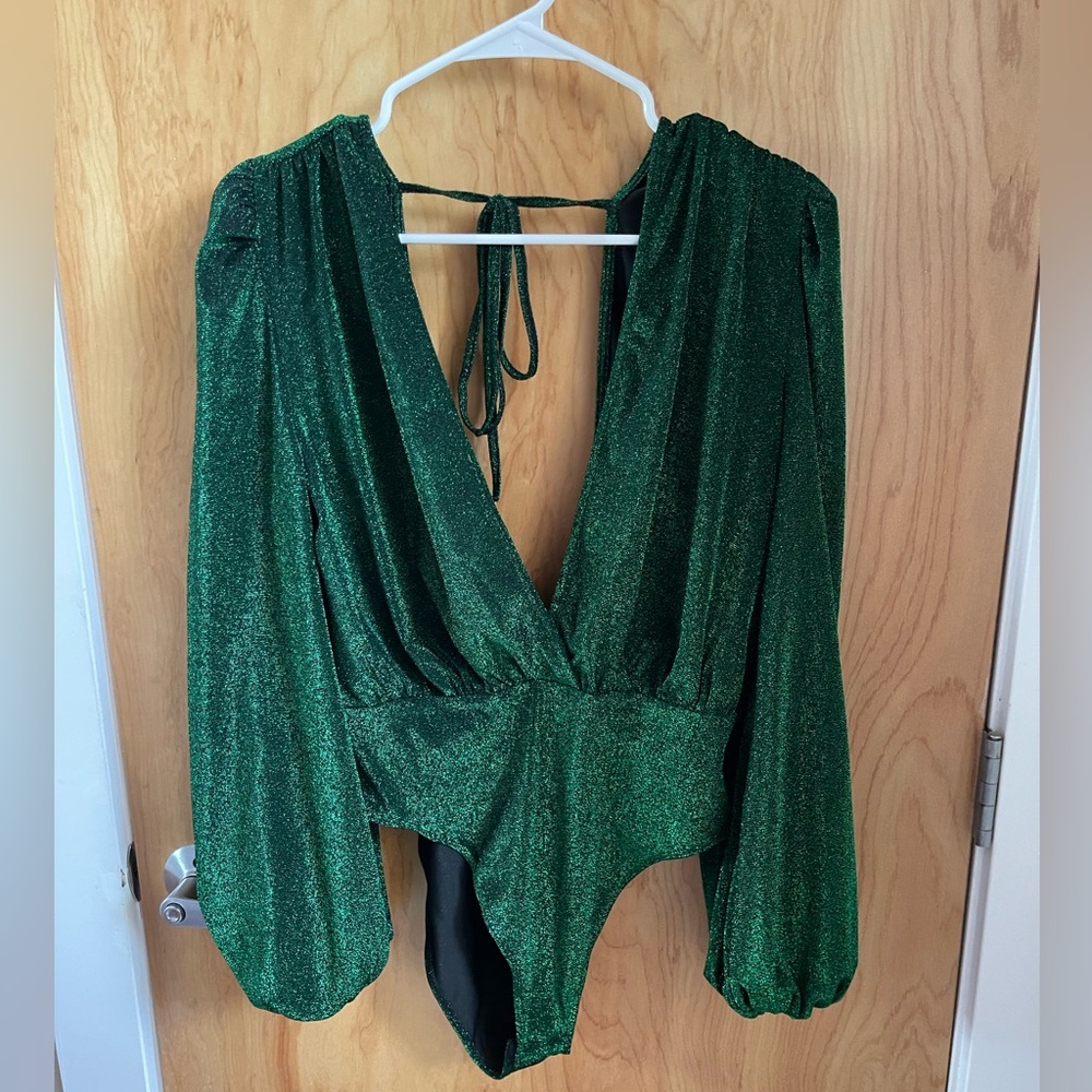 Green sparkly body suit